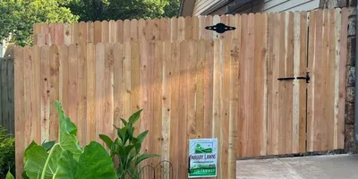 Cedar privacy fence installation showing cost factors in Tulsa